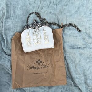 Patricia Nash White and Silver Clutch